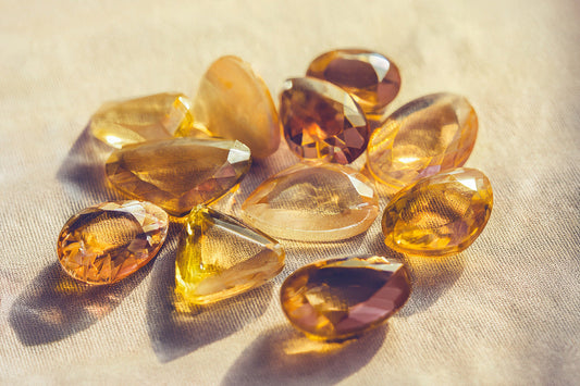 Citrine gemstones in warm golden tones symbolizing positivity and abundance