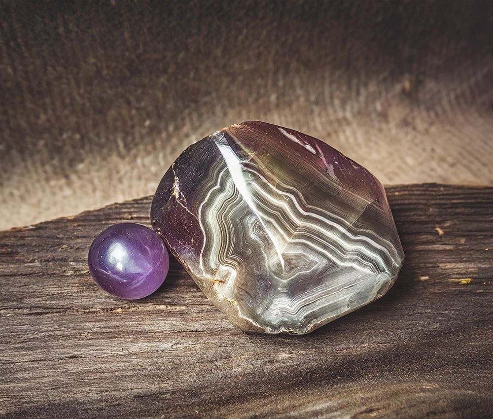 Ametrine crystal connected to the Solar Plexus, Third Eye, and Crown Chakras, symbolizing balance, clarity, and spiritual awareness.