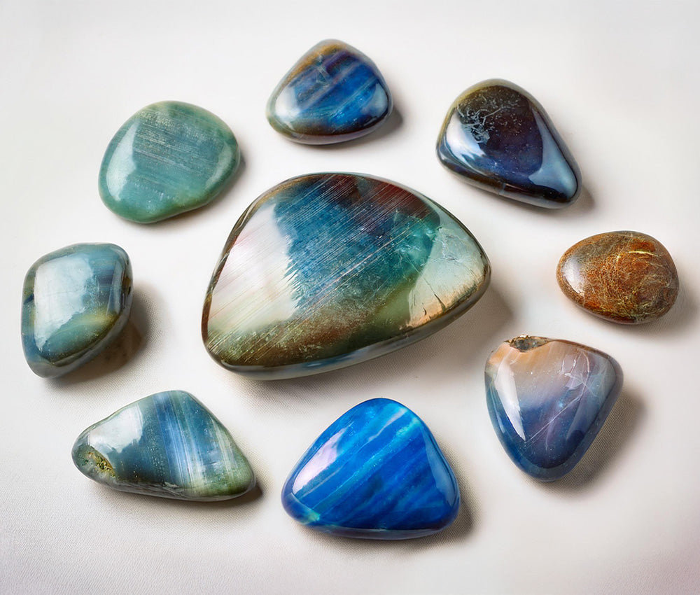 Labradorite stones on a neutral background, highlighting their connection to the Third Eye, Crown, and Throat Chakras for spiritual insight and clarity.