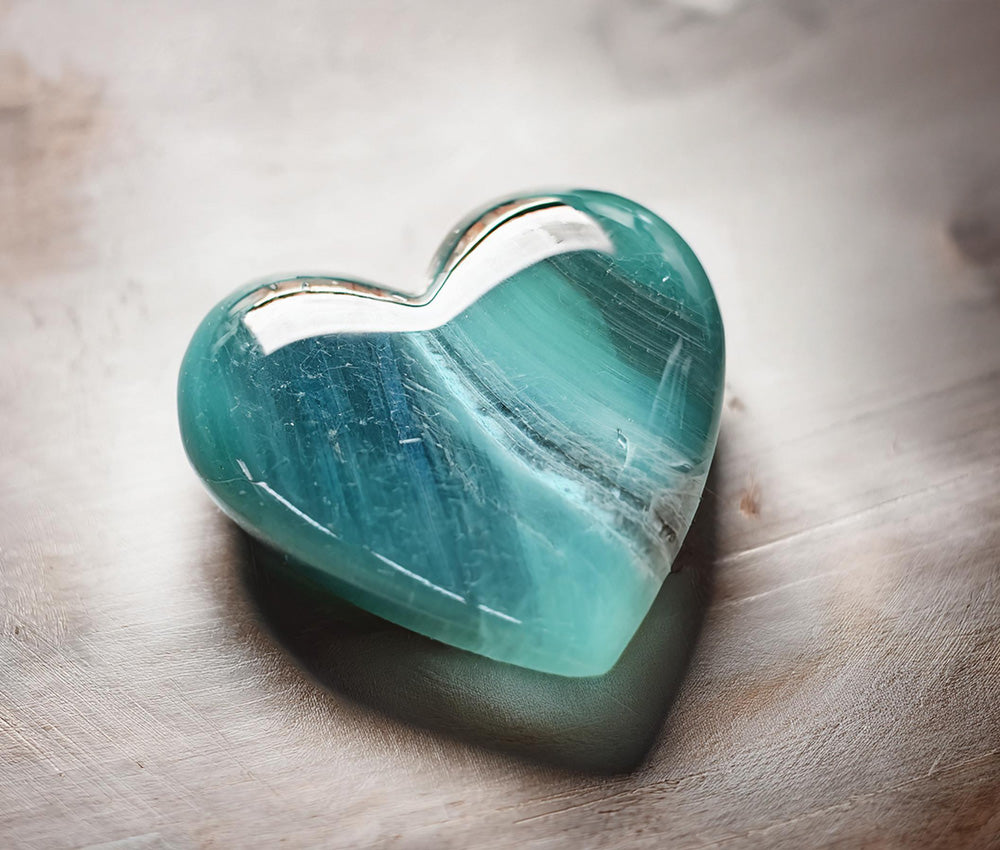 Amazonite crystal associated with the Heart Chakra for love and harmony, and the Throat Chakra for communication, truth, and self-expression.