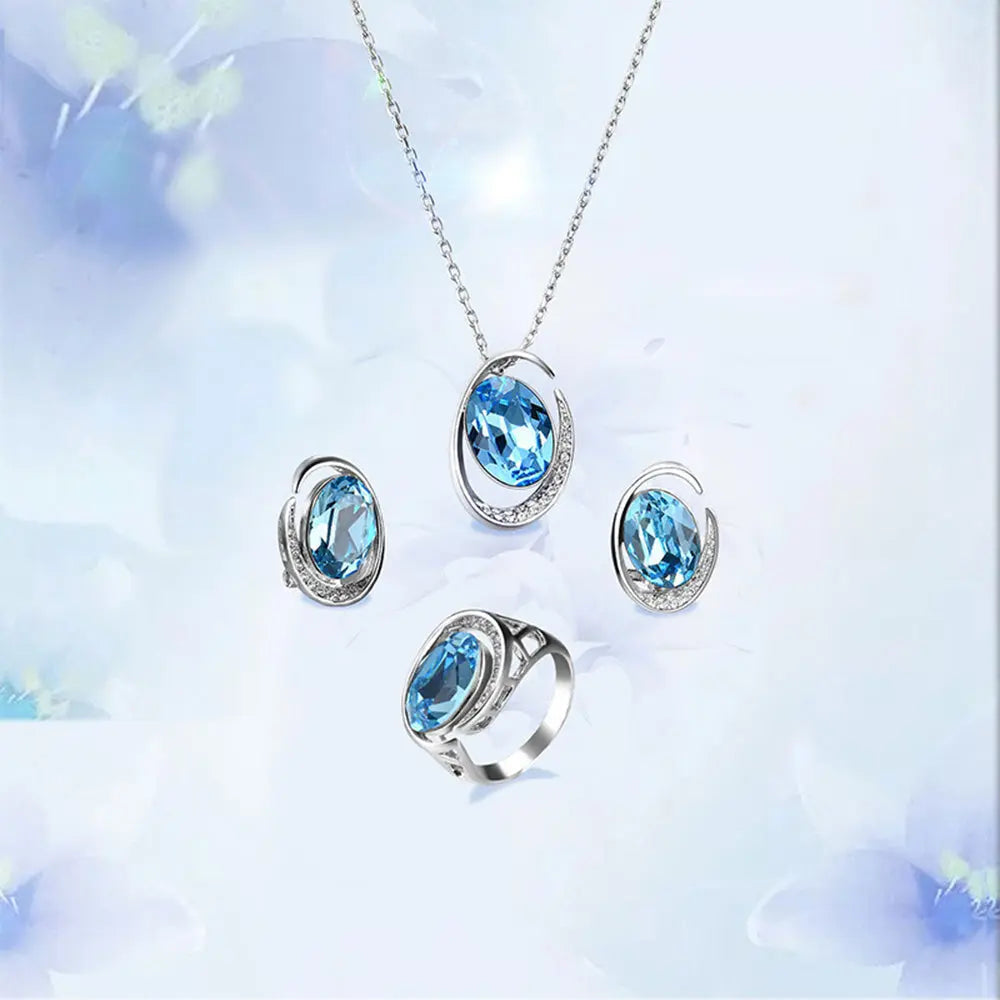 Luxurious Three-Piece Jewelry Set with Oval-Cut Blue Gemstone Gems Ritual