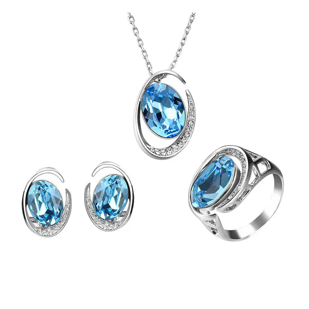 Luxurious Three-Piece Jewelry Set with Oval-Cut Blue Gemstone Gems Ritual