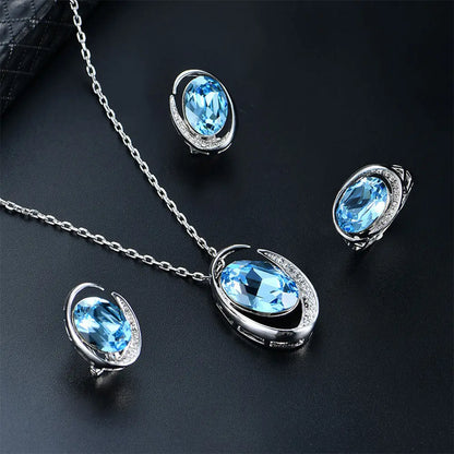 Luxurious Three-Piece Jewelry Set with Oval-Cut Blue Gemstone Gems Ritual