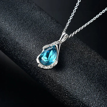 Elegant Teardrop Gemstone Pendant and Blue Zircon Earrings with Silver Necklace Gems Ritual