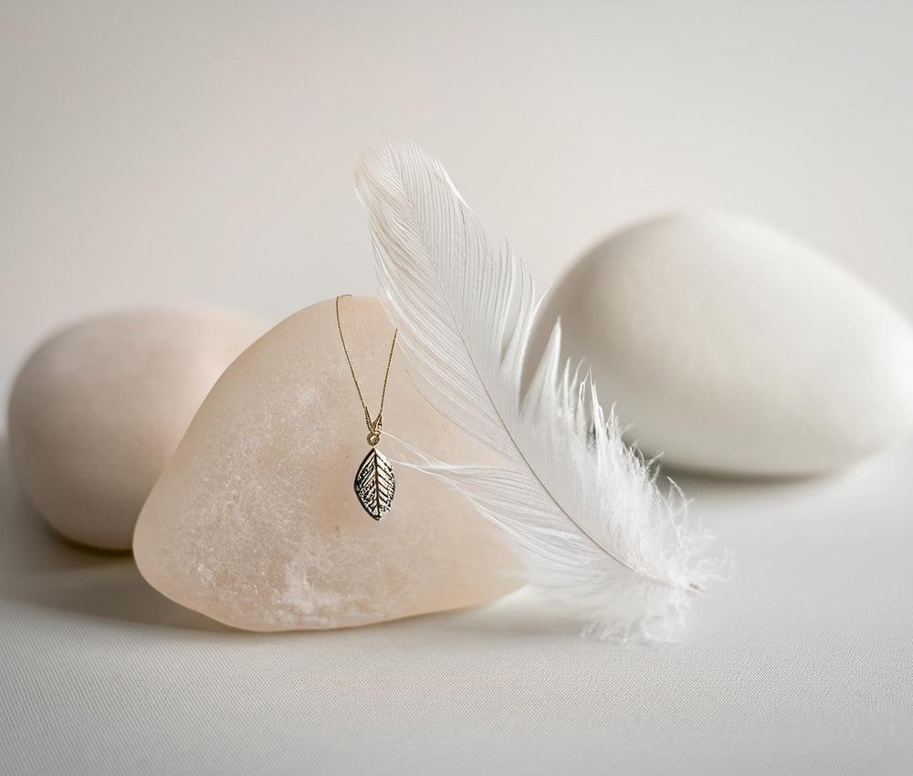 Selenite stones on a light surface, symbolizing divine light, spiritual communication, and their historical significance.