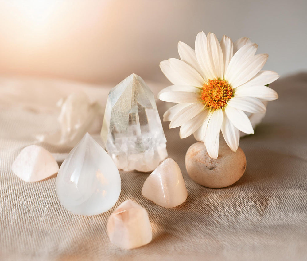 Quartz crystals on a light background, highlighting their connection to the Crown Chakra for clarity and spiritual connection.