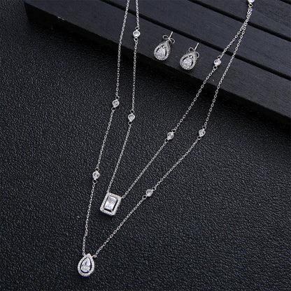 Elegant Zircon Bridal Set with Drop Earrings and Square Zirconium Necklace Gems Ritual